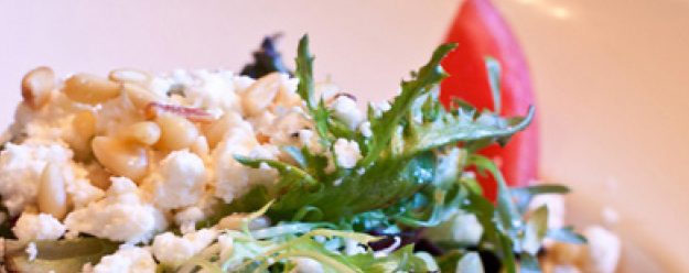 Mediterranean Salad: Field greens, ripe tomatoes, feta cheese, toasted pine nuts, kalamata olives, balsalmic vinaigrette dressing